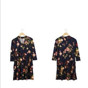 Black floral tunic with keyhole.
